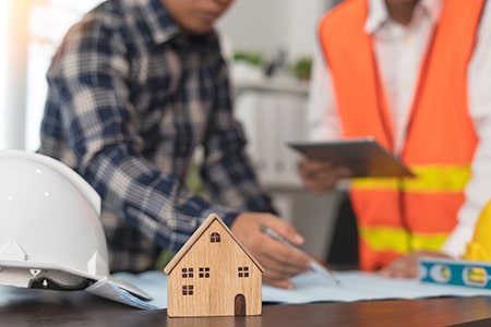 Contractor and Engineer Consult on Structures and Construction Plans