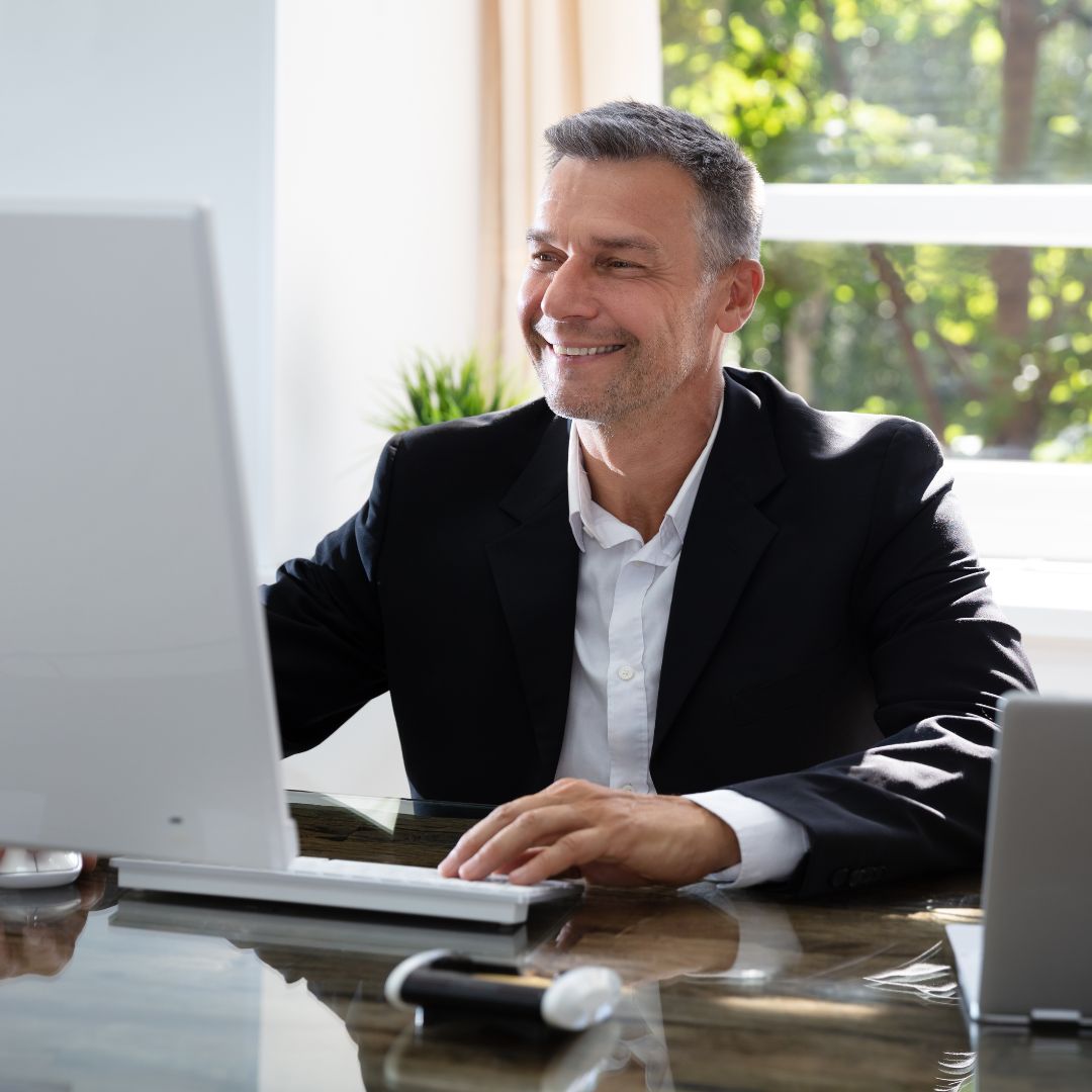 man on computer